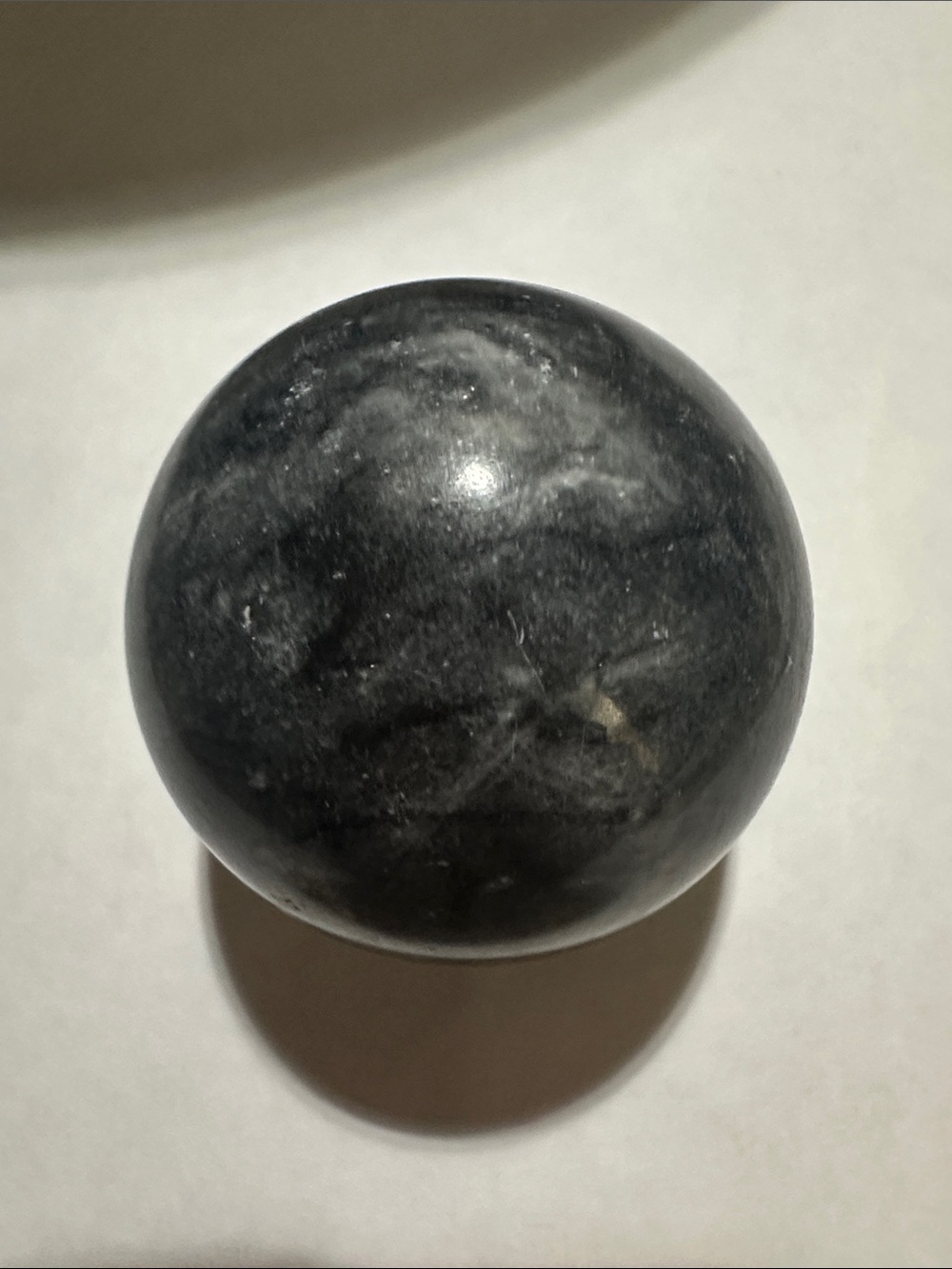 Decorative black/gray polished 2.0 inch diameter sphere.